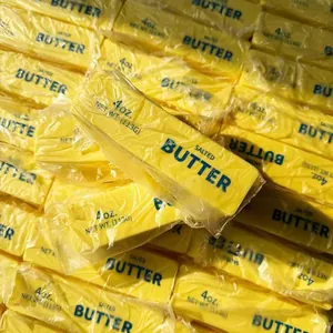 Detailed close-up showing realistic texture of butter stick shaped squeeze squishy toy