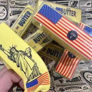 Detail view of slow-rising butter stick squishy toy with US flag design