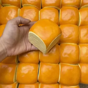 Realistic square orange bread squishy toy for stress relief and sensory play detail view