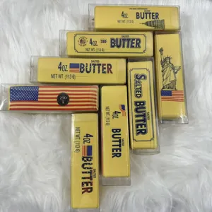 Close-up of butter stick squishy toys in US theme packaging for stress relief