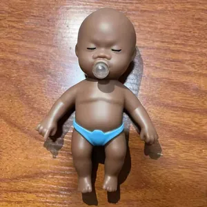 Realistische braune Miniatur-Babypuppe zum Drücken mit Seifenblase zum Stressabbau