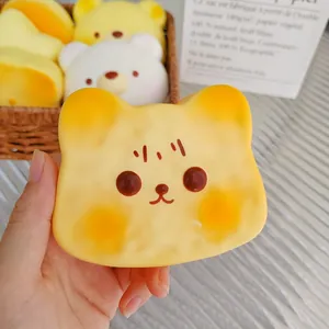 Close-up of cute yellow butter bear squishy toy for stress relief with soft texture
