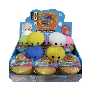Set of Rainbow Mystery Squishy Bun fidget toys in colorful blind box display box