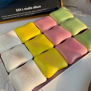 Soft butter toast slow rebound squishy toys in assorted pastel colors arranged in tray
