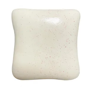 Soft creamy white toast squishy toy with red speckles for slow rebound stress relief