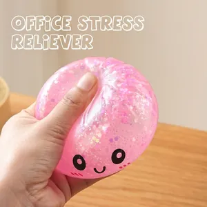 Roze glitter bun squishy speeltje voor stressverlichting met schattig lachend gezicht