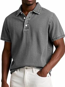 Detail showing the vintage grey denim texture of a men's short-sleeved polo shirt.