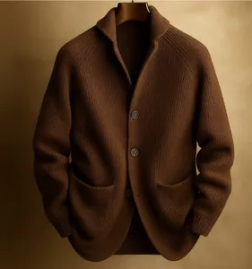 Detail view of a brown knit cardigan with shawl collar and texture.