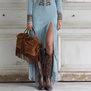 Vintage ethnic style light blue long dress with floral embroidery and long fringe hem