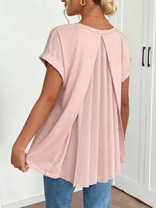 Detailed back view of pink short sleeve top featuring elegant pleated design