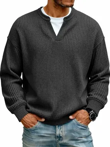 Close-up of charcoal waffle knit fabric on mens faux two-piece long sleeve shirt