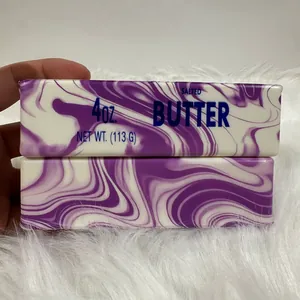 Macro view of the purple and white marble swirl butter stick slow rising squishy toy