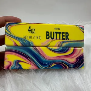Macro view showing the colorful swirl pattern and texture of the butter stick squishy toy.