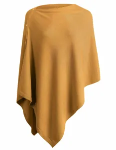 Elegant mustard yellow knit poncho with shoulder button details for autumn and winter