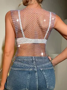 Close-up back view of a purple fishnet mesh top with sparkling rhinestone details