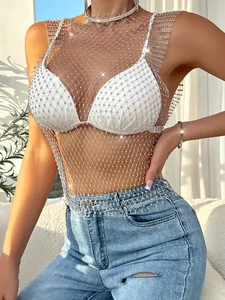 Macro detail view of elegant sparkly rhinestone fishnet mesh top with round neck design