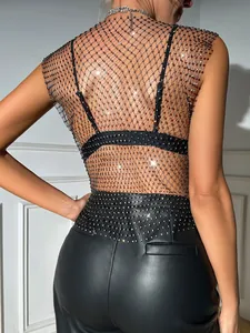 Detailed back view of a black mesh short sleeve top featuring sparkling rhinestone accents.
