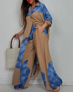 Detalle del conjunto de moda de camisa holgada de manga larga y pantalones de pierna ancha