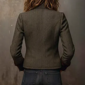 Retro herringbone tweed blazer for women with velvet trim cuffs shown from the back
