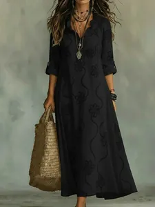 Bohemian black cotton linen maxi dress with lace trim and floral print detailing