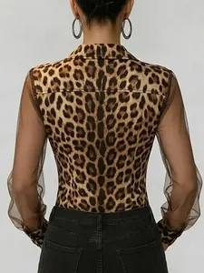 Elegant leopard print shirt featuring sheer mesh patchwork sleeves, back view detail