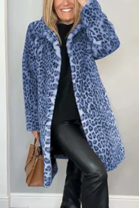 Detailed view of a model showcasing the blue leopard print faux fur coat texture and fit
