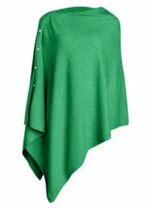Detail of green knitted poncho shawl featuring elegant side button closure for women