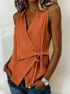 Haut cache-cœur orange sans manches élégant pour femme avec détail de nœud sur le côté