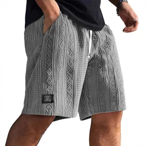 Men's grey textured jacquard casual shorts with drawstring waist and logo label