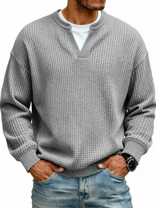 Close-up of men's gray waffle knit long sleeve T-shirt with a faux two-piece collar