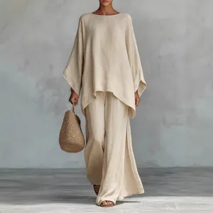 Elegante conjunto beige de lino para mujer con túnica holgada y pantalones de pierna ancha
