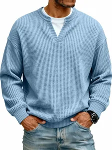 Detailed view of sky blue waffle knit texture and fake two-piece collar design