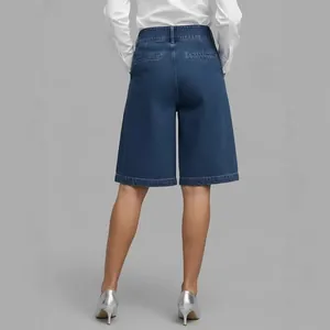 High-waisted denim Bermuda shorts for women in a classic dark blue wash finish style