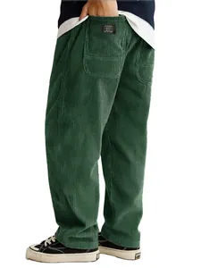 Detailed side view showing green corduroy texture and back pocket label on men's pants.