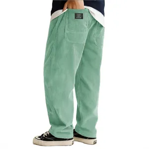 Premium men's loose mint green corduroy casual pants with classic pocket tag detail