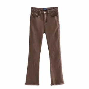Jeans a zampa marroni a vita alta con orli sfrangiati vintage e denim elasticizzato