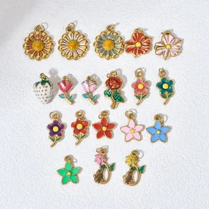 Detailed view of colorful stainless steel enamel flower and fruit pendants for DIY jewelry