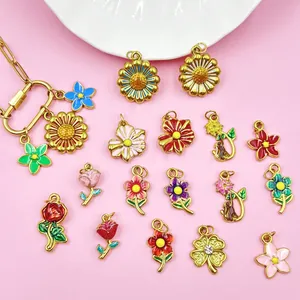 Detailed view of colorful enamel flower charms and daisy pendants for DIY jewelry