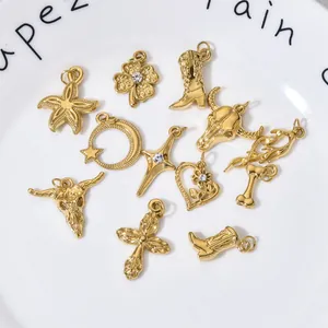 Detailed view of assorted gold stainless steel charms for DIY jewelry making.