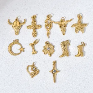 Variety of retro gold stainless steel charms including bull skull and cross for DIY jewelry