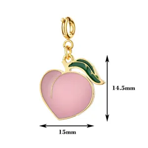Close-up of pink enamel peach charm showing dimensions 14.5mm by 15mm with gold clasp.
