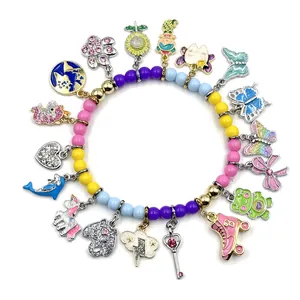 Detailed view of colorful beaded charm bracelet featuring various cute animal and shape pendants