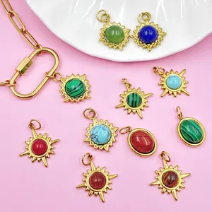 Detailed macro shot of sun-shaped and oval stainless steel gemstone charms for jewelry