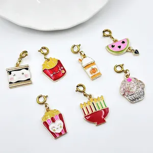 Detailed view of colorful enamel snack and holiday charms with gold lobster clasps