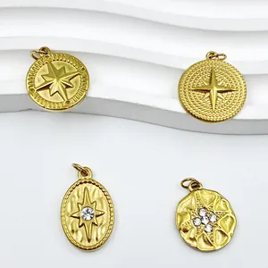 Close-up showing various gold stainless steel eight-pointed star pendant charms