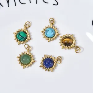 Detailed view of sun-shaped stainless steel pendants featuring various natural gemstones