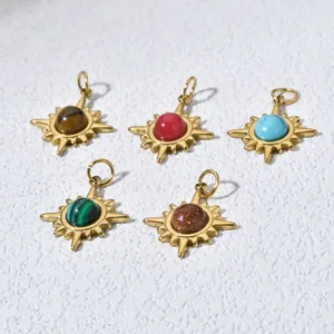 Detail shot of sun-shaped stainless steel charms featuring various colorful natural stones