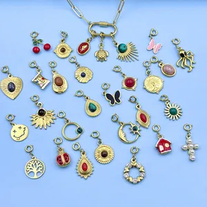 Collection of assorted gold-plated stainless steel DIY charms with colorful natural stones