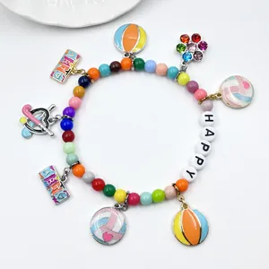 Colorful DIY sports charm bracelet featuring volleyball, golf, and happy letter beads.
