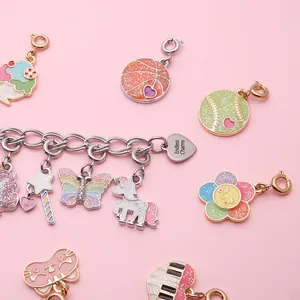 Detailed macro view of various colorful glitter enamel charms for DIY jewelry making